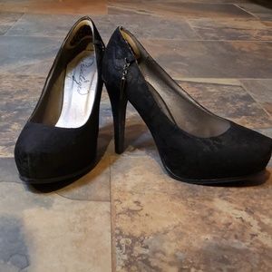 Black lace pumps